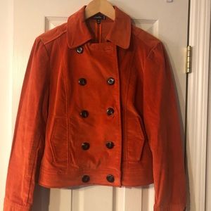 Women’s Orange blazer/jacket.